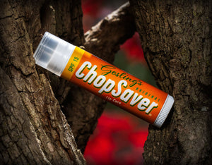 ChopSaver SPF 15 Lip balm in between trees